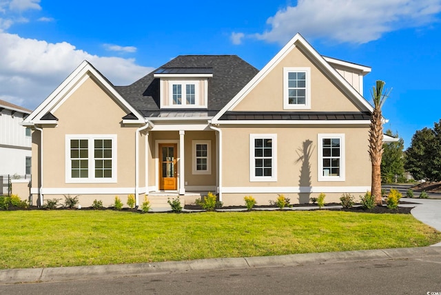 view of front of home with a front yard