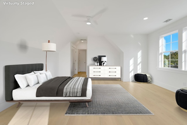 bedroom featuring light wood-type flooring and ceiling fan