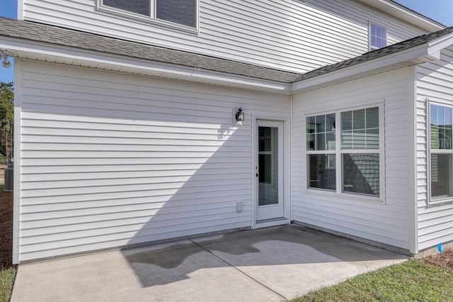 doorway to property featuring a patio area