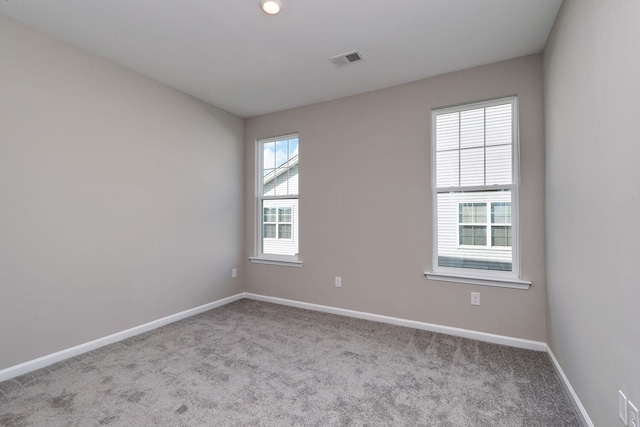 view of carpeted spare room