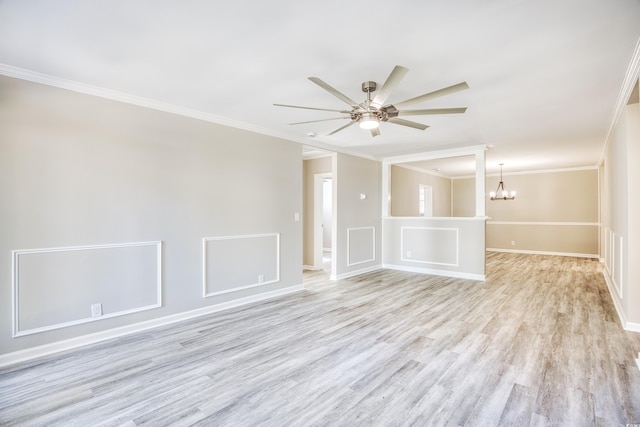 615 1st Ave N, Surfside Beach, SC 29575 - unfurnished room featuring ornamental molding, light wood finished floors, a chandelier, ceiling fan, and baseboards