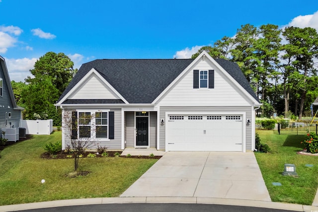 view of front facade featuring central AC unit, a garage, and a front yard