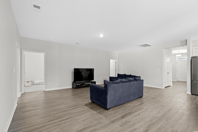 living room with hardwood / wood-style flooring