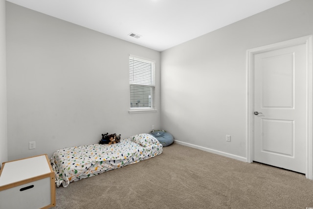 bedroom featuring carpet floors