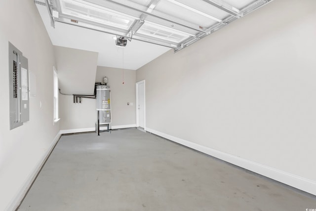 garage featuring electric panel, a garage door opener, and water heater