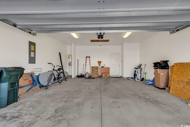 garage featuring electric panel and a garage door opener