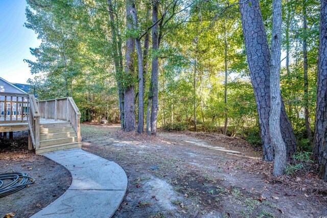 view of yard featuring a deck