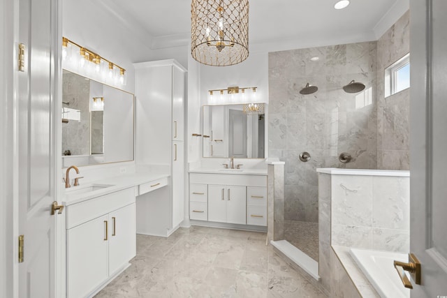 bathroom with crown molding, vanity, and independent shower and bath