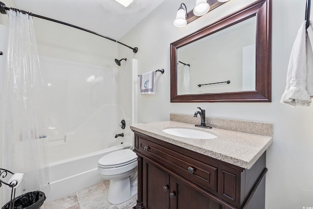 full bathroom featuring vanity, shower / bath combo with shower curtain, and toilet