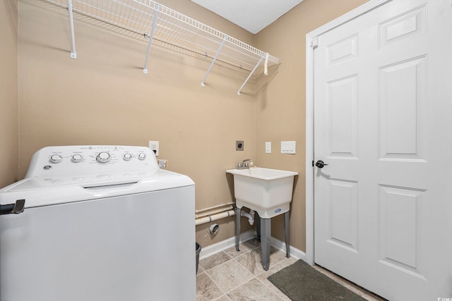 laundry room featuring washer / dryer