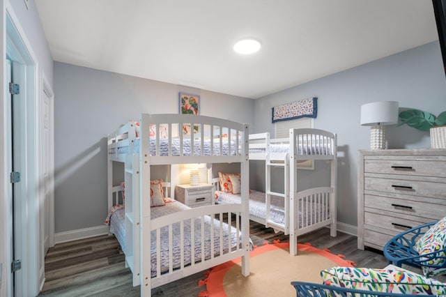 bedroom featuring dark wood-type flooring