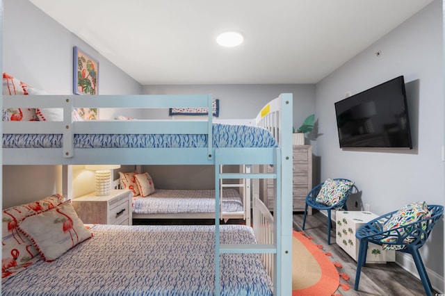 bedroom featuring wood-type flooring