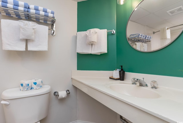 bathroom with toilet and sink