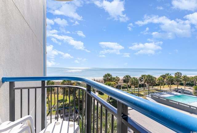 balcony featuring a water view