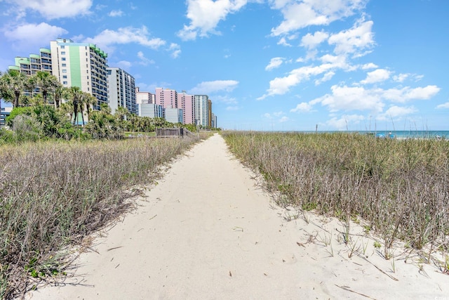 surrounding community featuring a water view