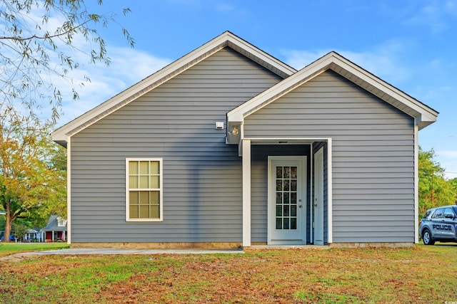 exterior space with a lawn