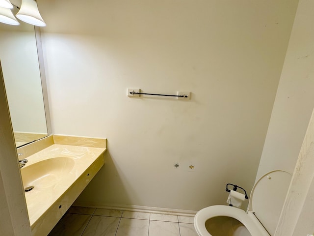 bathroom with tile patterned floors, vanity, and toilet