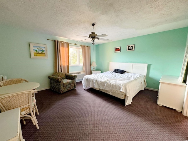 carpeted bedroom with a wall mounted air conditioner, a textured ceiling, and ceiling fan