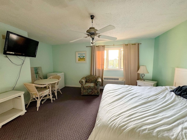 carpeted bedroom featuring a wall mounted AC, a textured ceiling, and ceiling fan