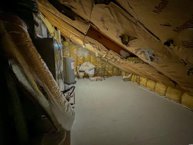 unfinished attic with electric water heater