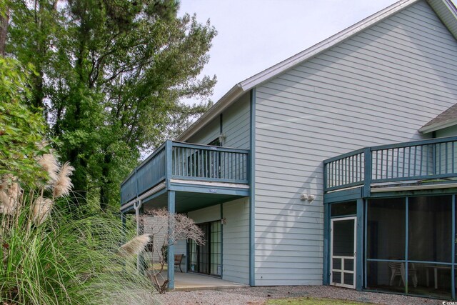 4337 Spa Dr Unit 1309, Little River, SC 29566 - back of house featuring a balcony and a patio area