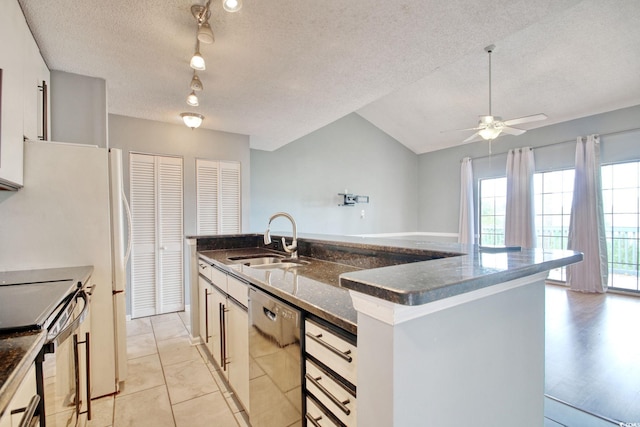 4337 Spa Dr Unit 1309, Little River, SC 29566 - kitchen featuring dishwasher, range with electric stovetop, a ceiling fan, a center island with sink, and a textured ceiling