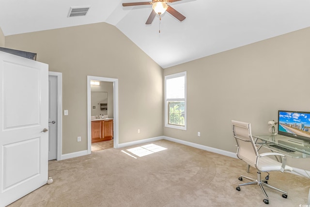 unfurnished office featuring ceiling fan, high vaulted ceiling, and light colored carpet