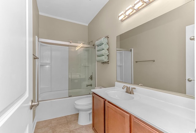 full bathroom with vanity, enclosed tub / shower combo, toilet, and tile patterned floors