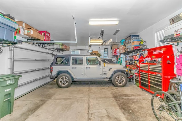 garage featuring a workshop area