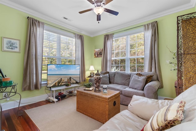 living room featuring ceiling fan, hardwood / wood-style floors, and ornamental molding