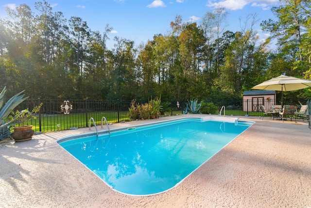 view of swimming pool featuring a patio