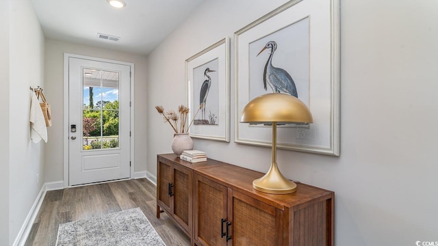 doorway featuring hardwood / wood-style flooring