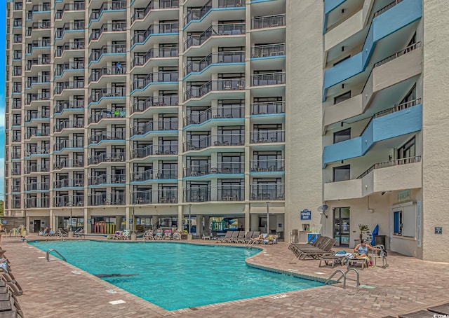 view of pool with a patio