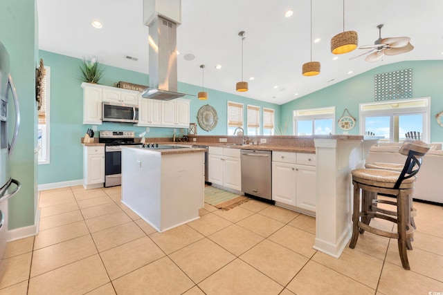 kitchen with white cabinetry, pendant lighting, ceiling fan, and stainless steel appliances