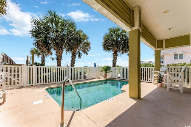 view of swimming pool featuring a patio