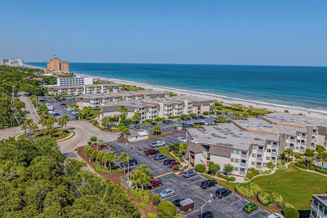 5601 N Ocean Blvd Unit C-305, Myrtle Beach, SC 29577 - drone / aerial view of waterfront with a beach and apartment complex
