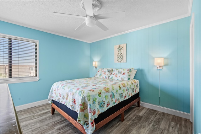 5601 N Ocean Blvd Unit C-305, Myrtle Beach, SC 29577 - bedroom featuring wood finished floors, baseboards, a textured ceiling, ornamental molding, and ceiling fan