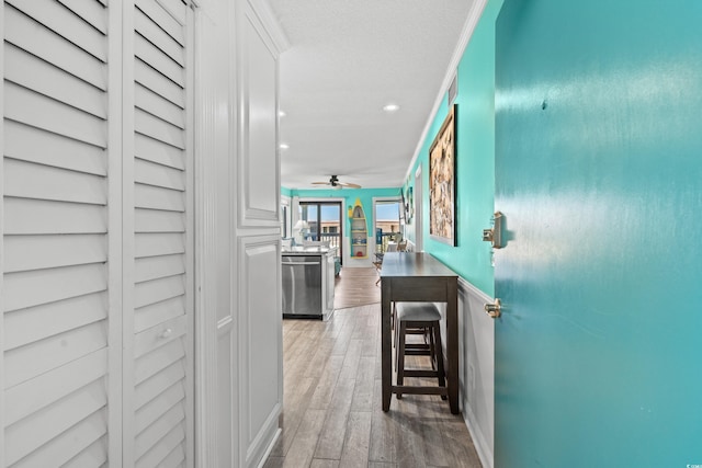 5601 N Ocean Blvd Unit C-305, Myrtle Beach, SC 29577 - hallway featuring recessed lighting, light wood-style floors, baseboards, and a textured ceiling