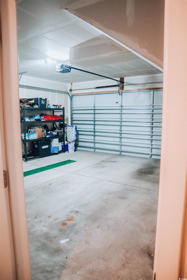 garage featuring a garage door opener