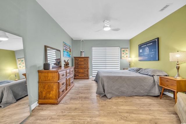 bedroom featuring light hardwood / wood-style flooring and ceiling fan