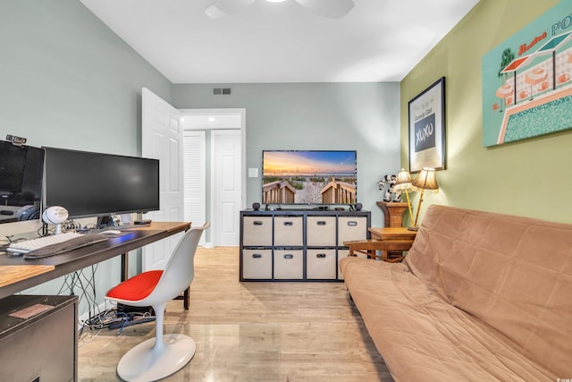 office space with light wood-type flooring