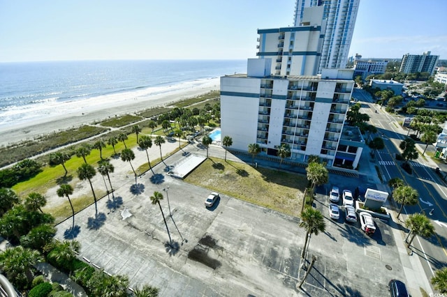 aerial view featuring a water view and a beach view