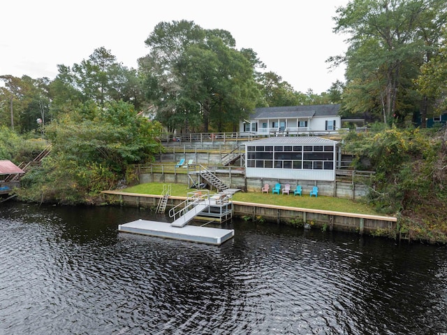 dock area with a water view