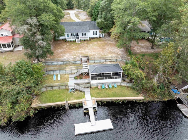 bird's eye view with a water view