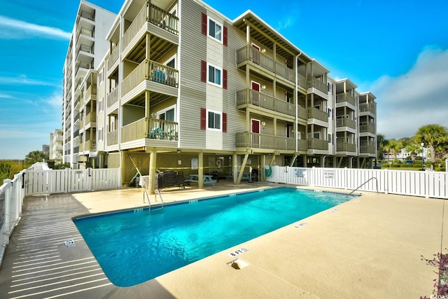 view of pool featuring a patio area