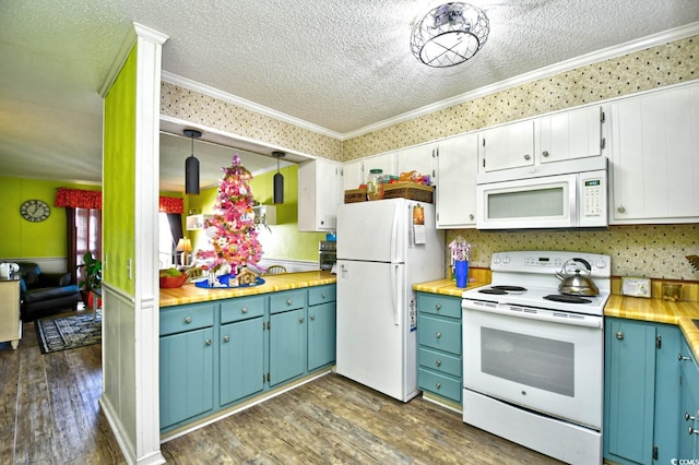 4305 S Ocean Blvd Unit 205, North Myrtle Beach, SC 29582 - kitchen featuring white appliances, dark wood-style flooring, a textured ceiling, crown molding, and blue cabinets