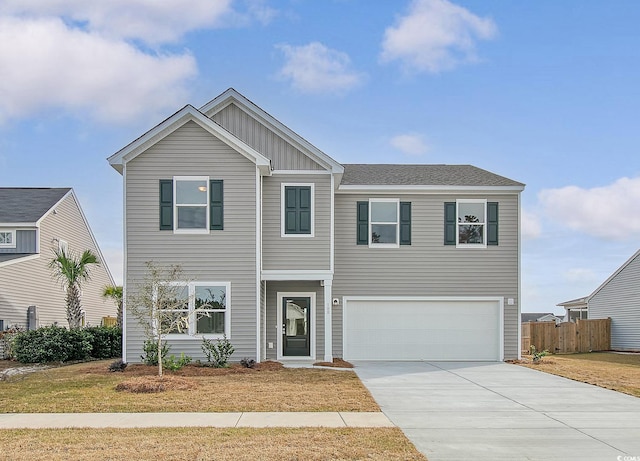 view of front of property featuring a garage