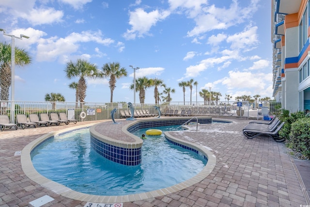 view of pool with a patio