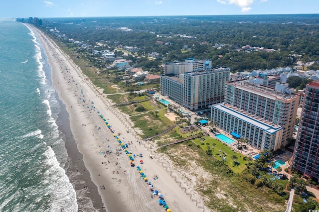 bird's eye view featuring a view of the beach and a water view