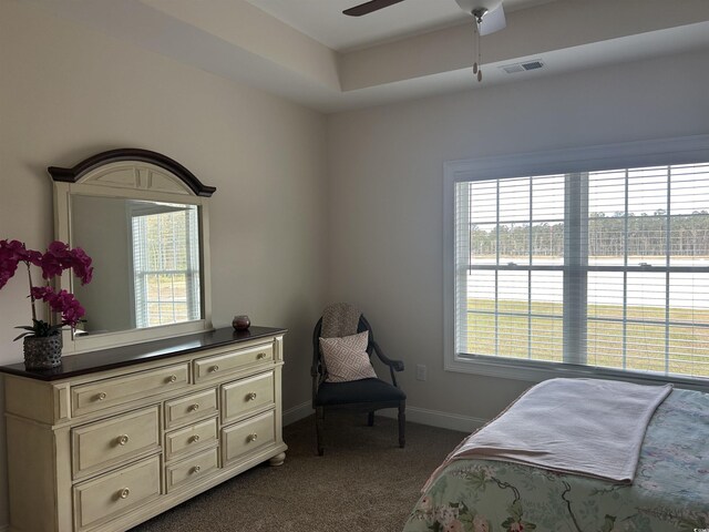 2327 King Farm Rd, Aynor, SC 29511 - bedroom with baseboards, visible vents, dark carpet, and a ceiling fan